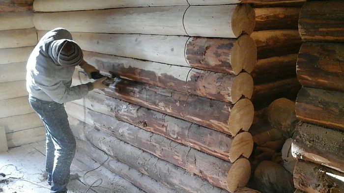 шлифовка дома из оцилиндрованного бревна